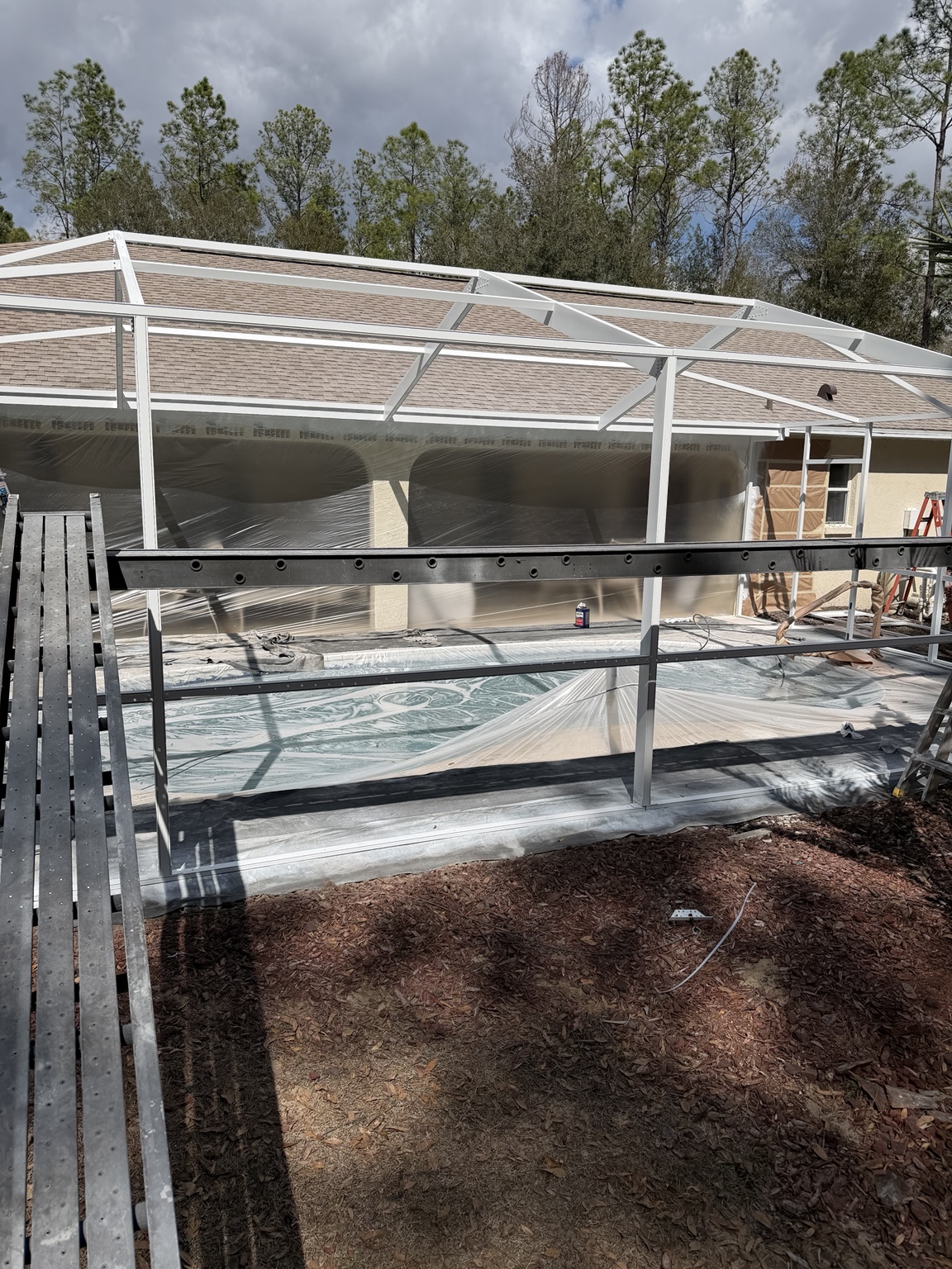 Pool and home covered for enclosure restoration
