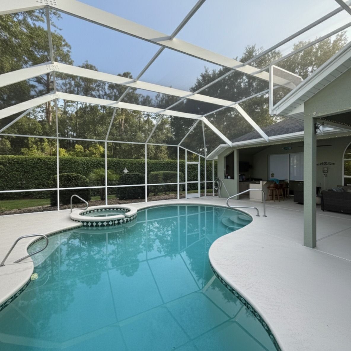 Clean enclosure and pool deck after pressure washing